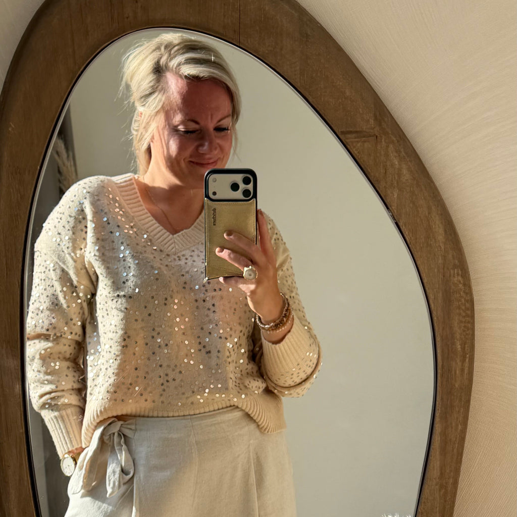 Beige trui met pailletten