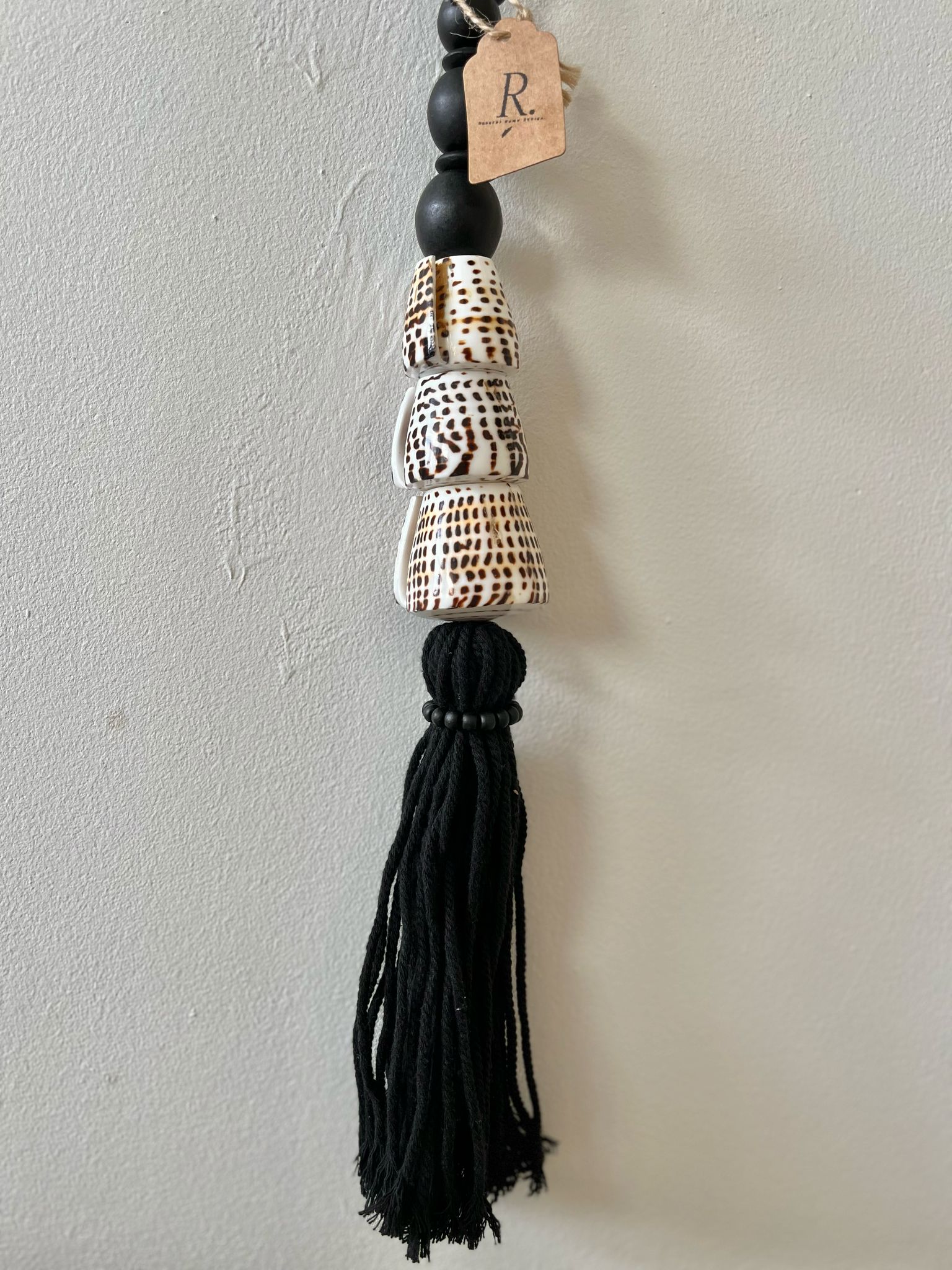 Schelpen tassel zwart