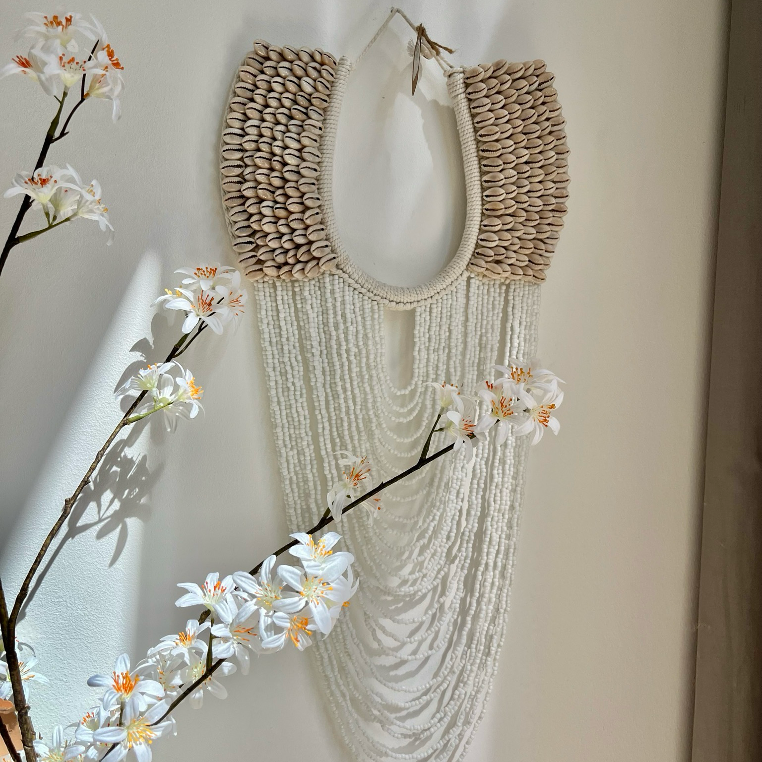 Muur ornament schelp en kraal