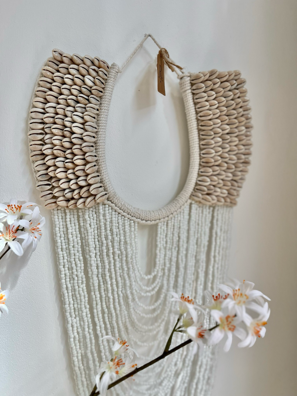 Muur ornament schelp en kraal