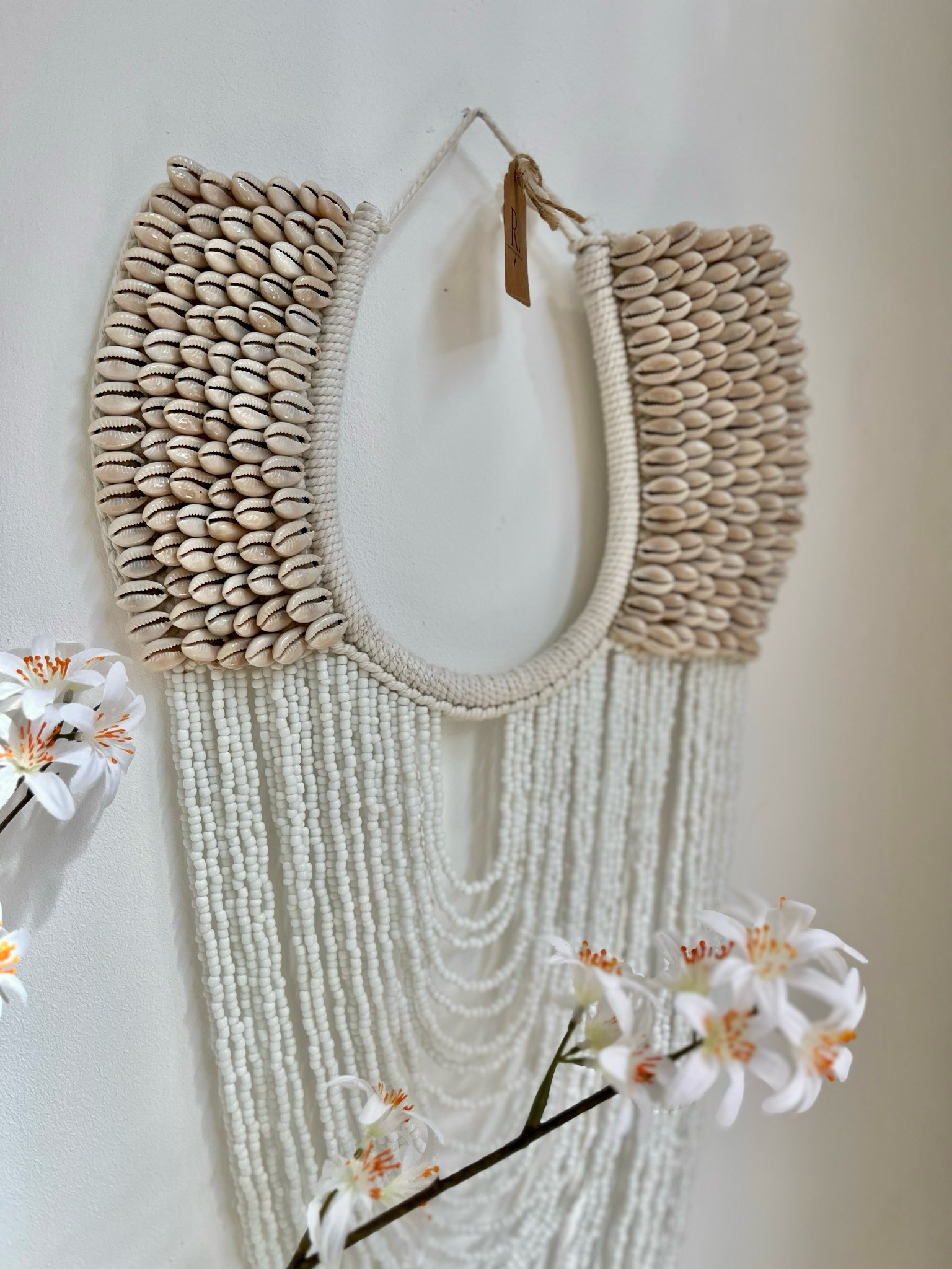 Muur ornament schelp en kraal