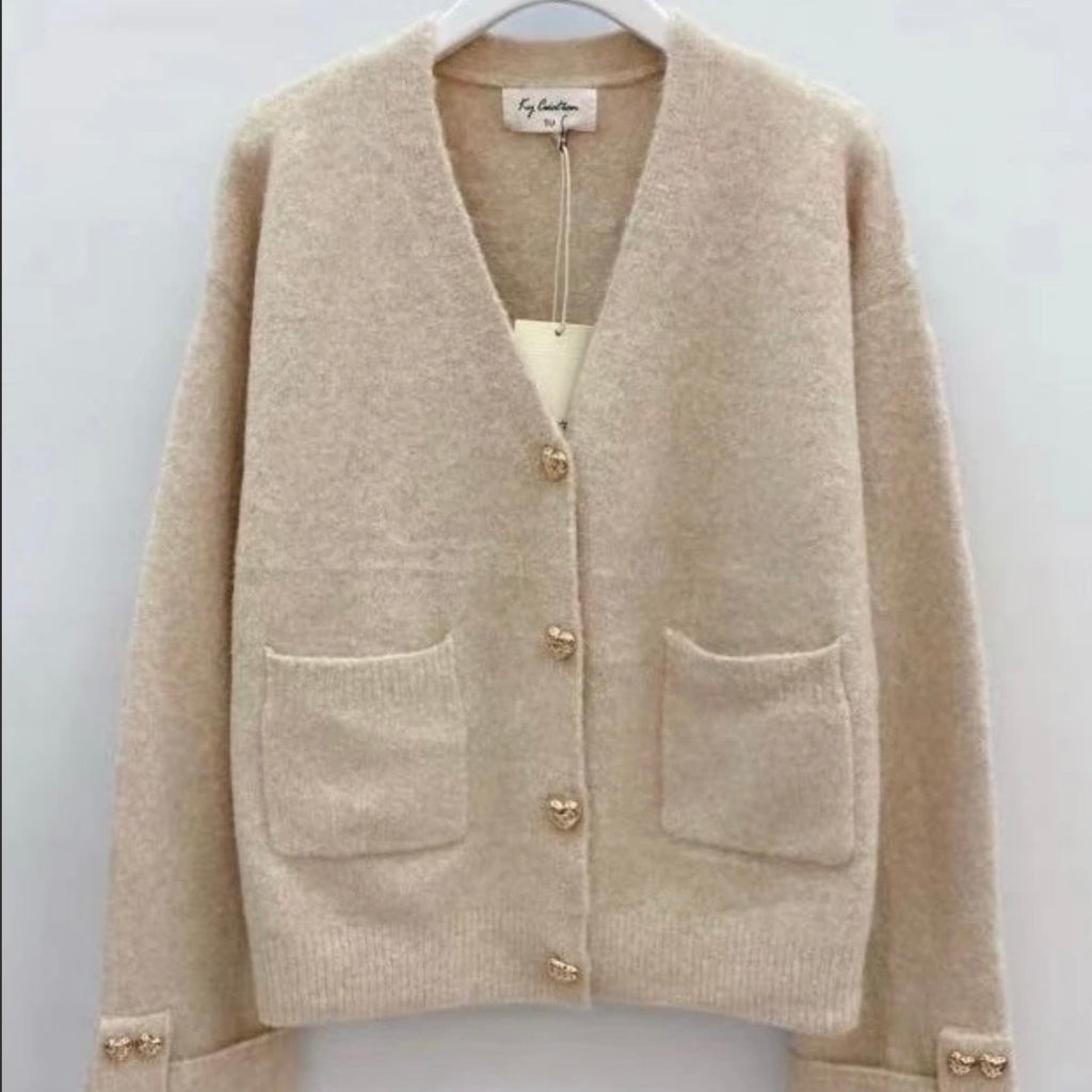 Beige vest hartjes