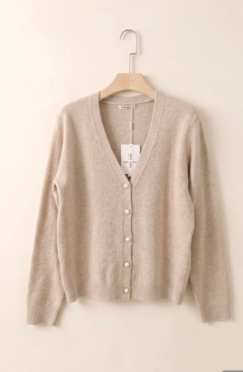 Beige vest met parel knopen