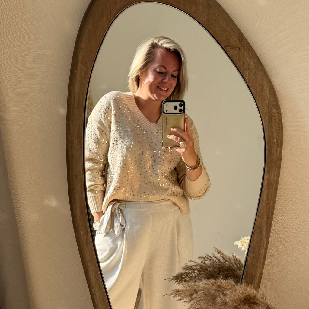 Beige trui met pailletten