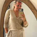 Beige vest met parel knopen