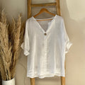 Linnen blouse met knoop